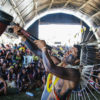 An Indigenous man practices a ritual in front of a large crowd during the Free Land Camp 2022. Around 6,000 Indigenous people gathered in Brasília where they debated current issues that are affecting Indigenous and traditional peoples’ rights.