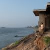 Hak Bopha of Roka Koang commune watches out over the Mekong River where sand mining barges pass by