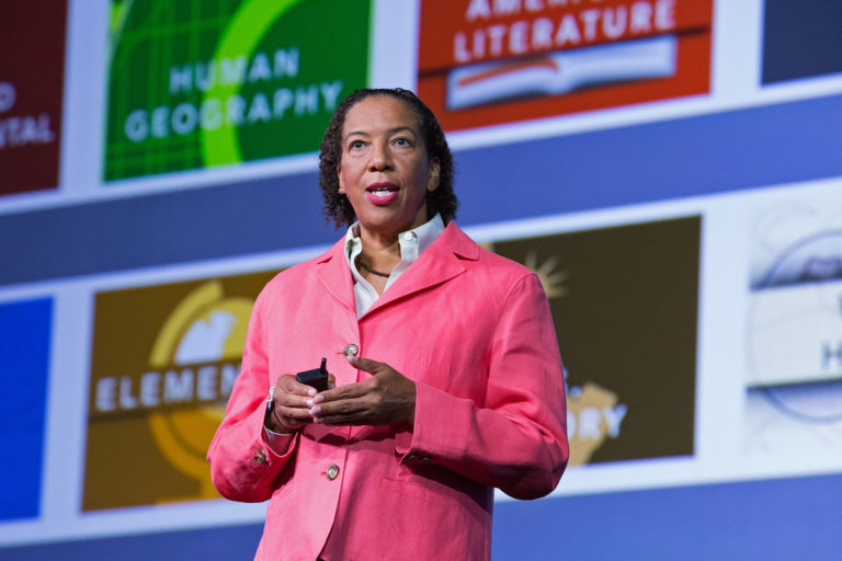 Dawn Wright giving a talk at an event.