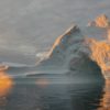 An iceberg floats in Disko Bay, near Ilulissat, Greenland, on July 24, 2015. The massive Greenland ice sheet is shedding about 300 gigatons of ice a year into the ocean, making it the single largest source of sea level rise from melting ice. Image by NASA/Saskia Madlener via Flickr (CC BY-NC-ND 2.0).