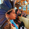 Glicéria Tupinambá watches First Minister's Questions in the Scottish Parliament.