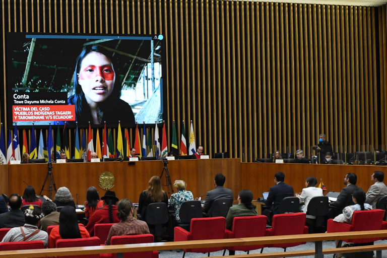 Tewe Dayuma Michela Conta, one of the girls kidnapped from the Tagaeri and Taromenane territory, speak during the trial. Image courtesy of the Inter-American Court of Human Rights via Flickr (CC BY-SA 2.0).