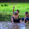 Children fishing in Thailand.