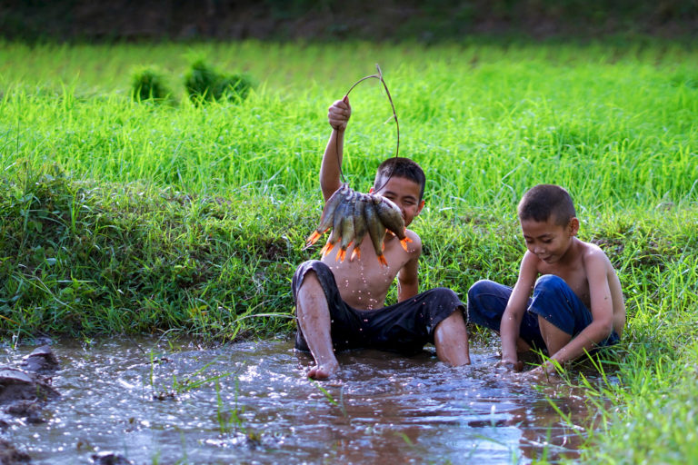 Children fishing in Thailand.