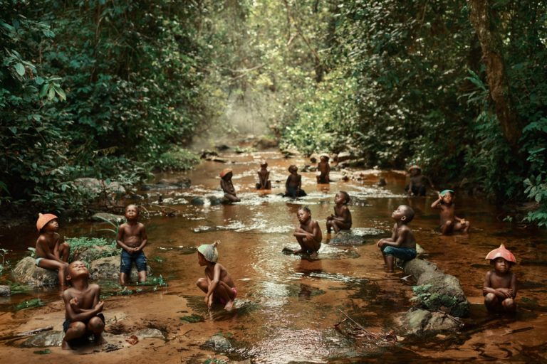 Children relaxing in the clear water of a shallow river in Odzala-Kokoua National Park, Republic of Congo. Image by Pieter Henket (CC BY-SA 4.0)