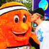 Brett Jenks visits with Mabi, the clown fish mascot of a community Pride campaign in the Philippines in 2011. Photo credit: Rare