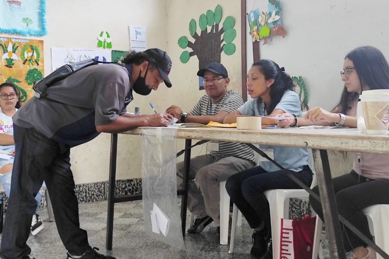 A resident of Asunción Mita confirms his identity and signature to vote in a school classroom during a municipal referendum on mining. Image by Sandra Cuffe.