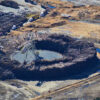 Aerial view showing a massive ring of thousands of whole trees at Enviva’s Sampson County, North Carolina