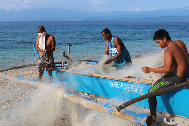 Fishers in San Agapito barangay on Verde Island in Batangas province prepare their nets in September.