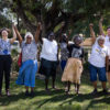 Traditional leaders and indigenous community members including Dennis Tipakalippa, far right, along with EDO Senior Solicitor Jordina Rust, second from left, celebrate their court victory. Image courtesy of Rebecca Parker.