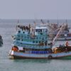 Commercial fishing vessels in Thailand. Image via pxhere.com (public domain).